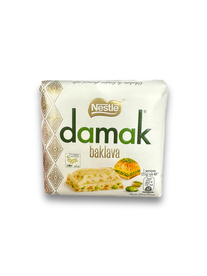 Nestle Damak Baklava 60g Vorderseite weiße Verpackung mit bunter Schrift und Bild Schokotafel