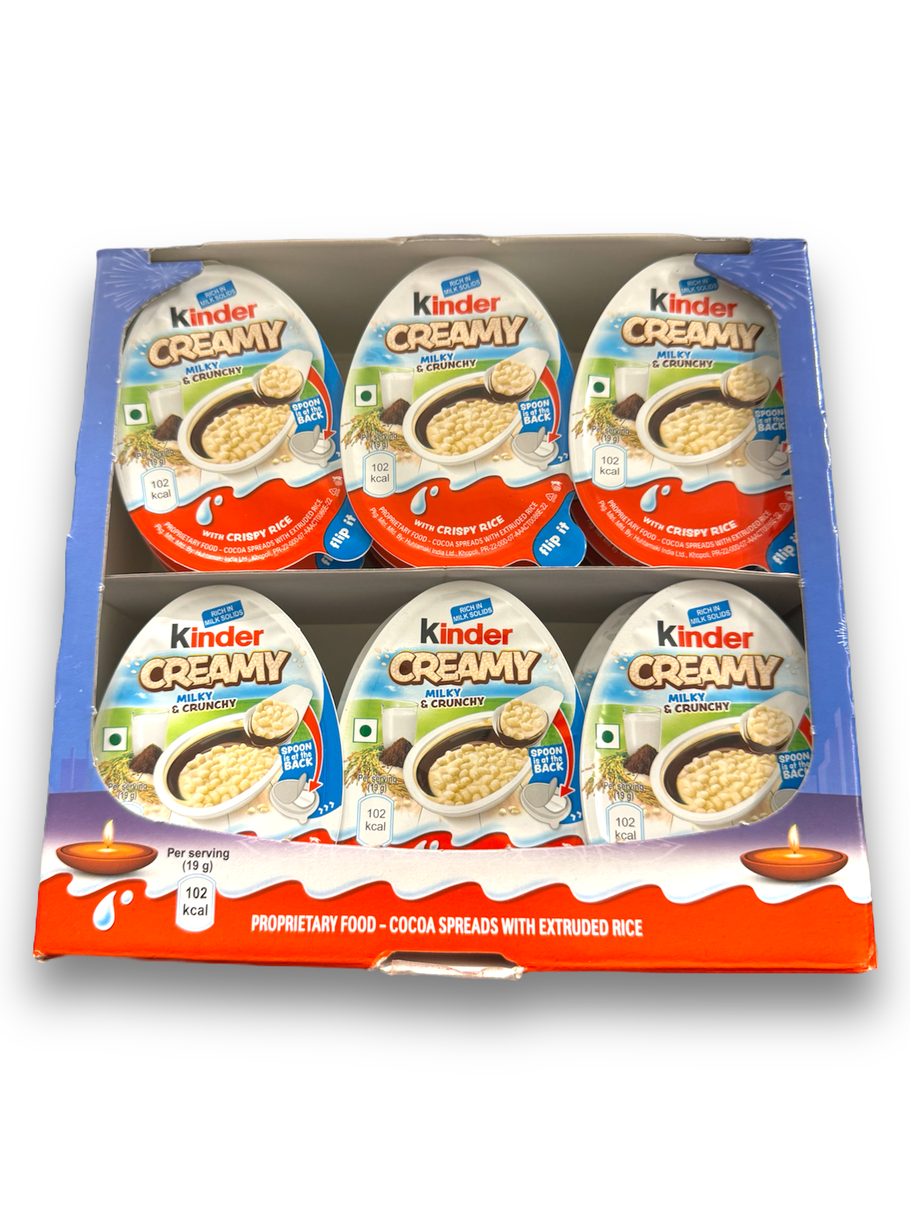 Kinder Creamy 19g von Oben Aufnahme der Verpackung in Form eines Ei und Produktabbildung